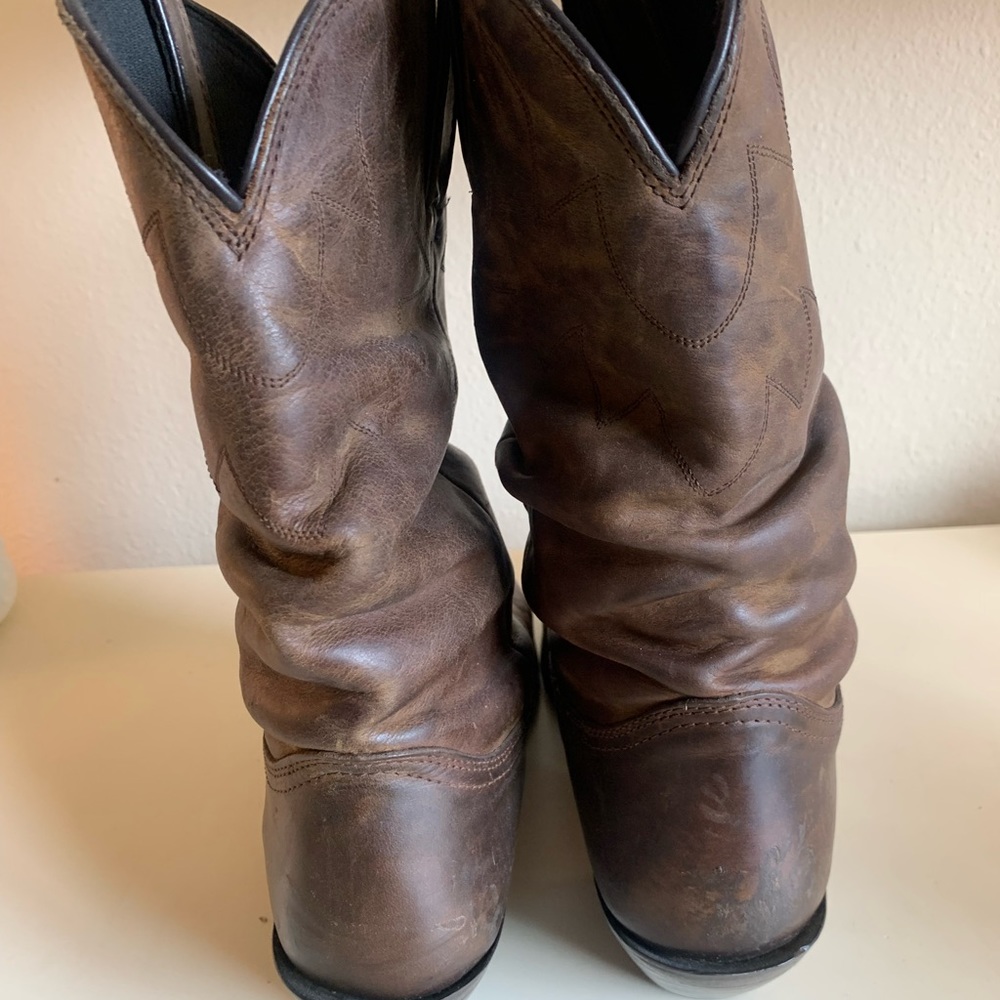Brown leather cowgirl boots
